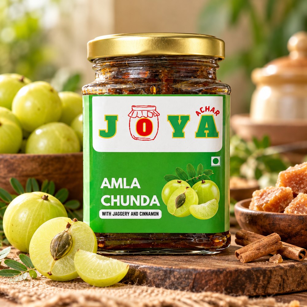 Jar of Joya Amla Chunda with jaggery and cinnamon, surrounded by fresh amla